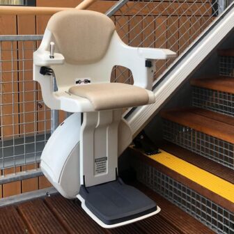 a straight stairlift for heavier users on straight wooden stairs