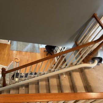 A Curved Stairlift Along The Inside Of The Stairs In Ontario, Canada