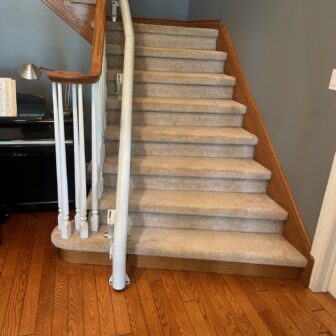 Stairlift Rail Along The Inside Of A Curve In Ontario, Canada
